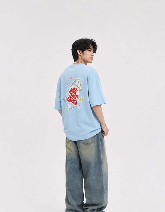 Back view of GUILTY PARTY baby blue oversized tee with colorful graphic back print in studio shoot saying vodka cranberry