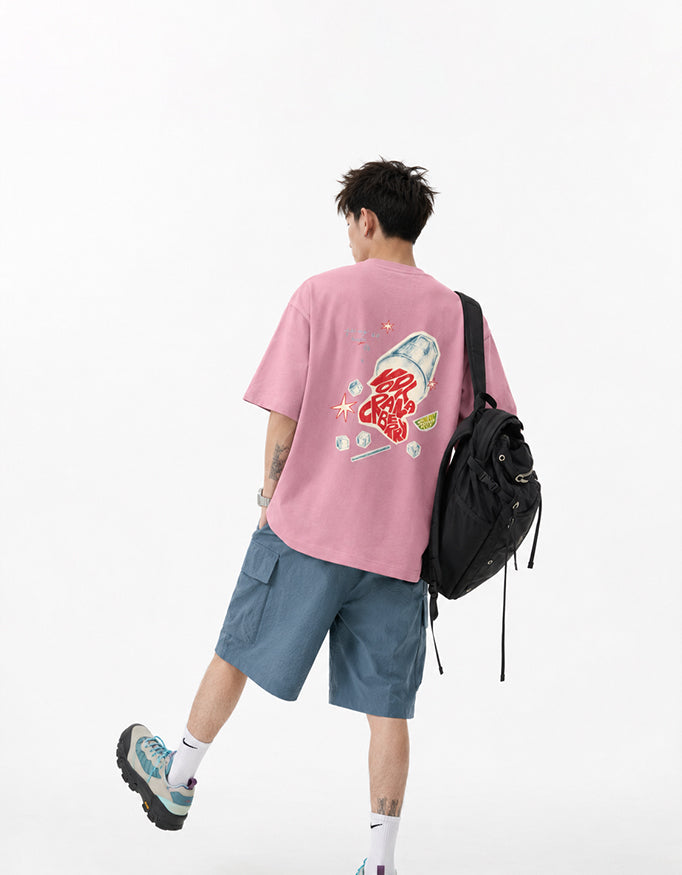 Back view of GUILTY PARTY baby pink oversized tee with colorful graphic back print in studio shoot saying vodka cranberry